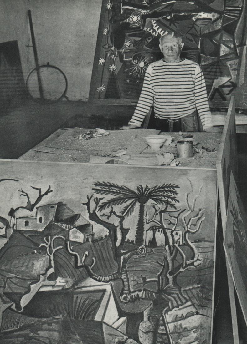 ROBERT DOISNEAU - Picasso with his canvases: Artist: ROBERT DOISNEAU Print Title: Picasso with his canvases Medium: Sheet-fed Gravure Printing Date: 1952 Printed in France Image Size: 6.5 x 9 inches Robert Doisneau (1912-1994) was a French photo