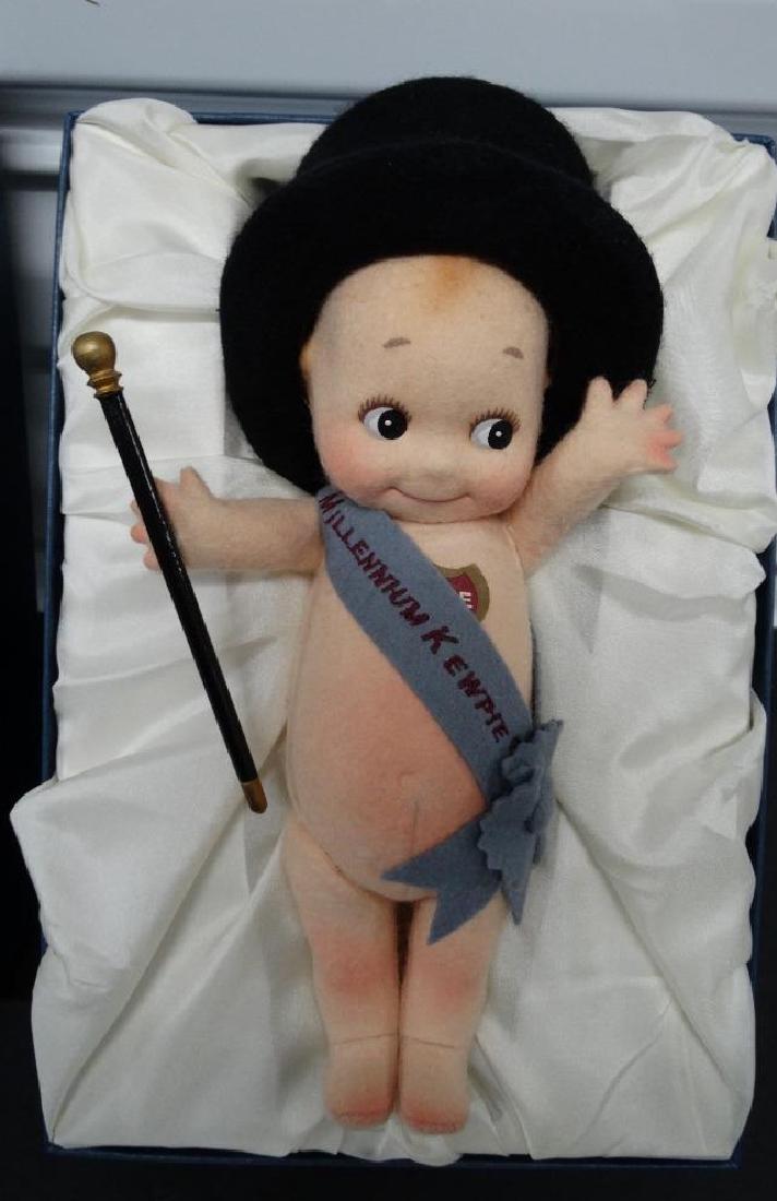 R. John Wright 2000 Millennium Kewpie Coa and Tag Reads: 2000 R. JOHN WRIGHT MILLENNIUM KEWPIE COA and TAG READS 119 of 500 Name: 8", all felt, fully jointed. Description: 7", wool felt, fully jointed. Date of Release: 2000 Edition Notes: Ltd. Ed. 500 ©KEW