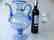 Venetian iridescent blue glass wine jug on foot, - 2