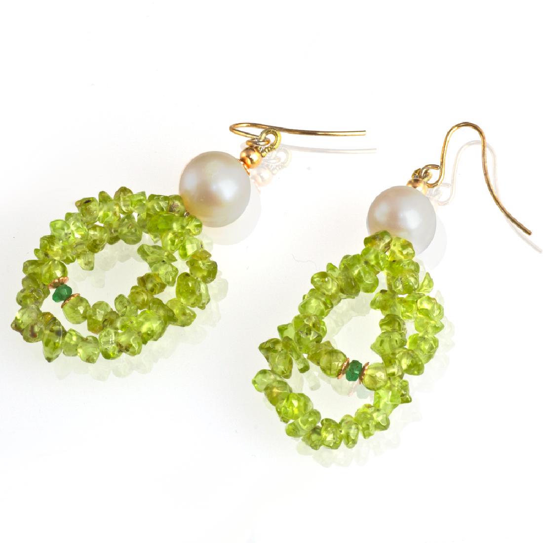 Peridot and Colombian Emeralds 0.22 carat total weight: Item: Peridot and Colombian Emeralds 0.22 carat total weight Earrings Brand: Regenz Metal Purity: .925 sterling silver Gemstones: Peridot, Colombian Emerald, Pearl Size/Dimensions: External length (in