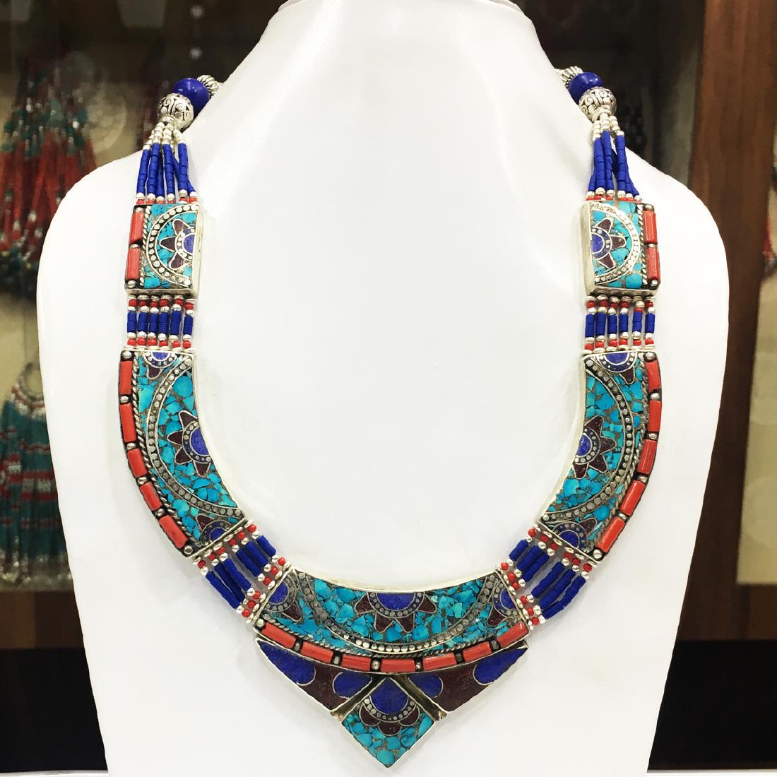 Buddhist Turquoise & Handmade Necklace: Item: Buddhist Turquoise & Handmade Necklace Handmade Origin: Tibetan Metal Purity: Tibetan silver Gemstones: Turquoise & Coral Size (inches): 20 Please note that this lot has a confidential reserve. 