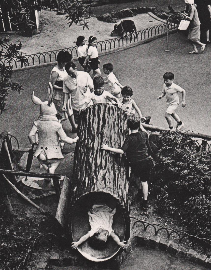 ANDRE KERTESZ - Playing in the Park: Artist: ANDRE KERTESZ Print Title: Playing in the Park in New York, 1966 Medium: Sheet-Fed Gravure Printing Date: 1976 Printed in Japan Image size approx. 7.25 x 9.25 inches Andre Kertesz (1894-1985)