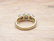 VINTAGE 1.25 CTW DIAMOND BAND IN 18 KARAT WITH BRITISH - 6