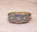 VINTAGE 1.25 CTW DIAMOND BAND IN 18 KARAT WITH BRITISH - 7