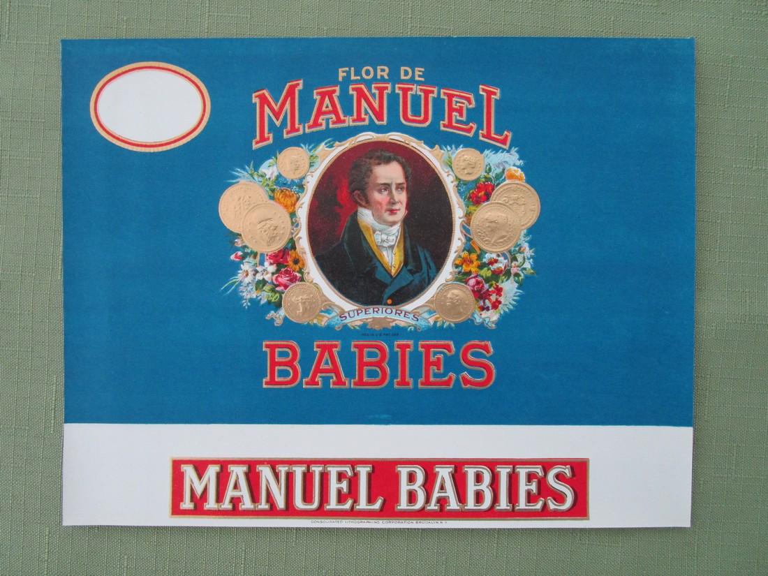 Flor De Manuel Babies Tobacco: Item: Flor de Manuel Babies Date: 1900-1920's Material: paper Dimensions: 8.25"wide x 6.25"high Framed portrait on bright blue ground Please note that this lot has a confidential reserve. When you lea