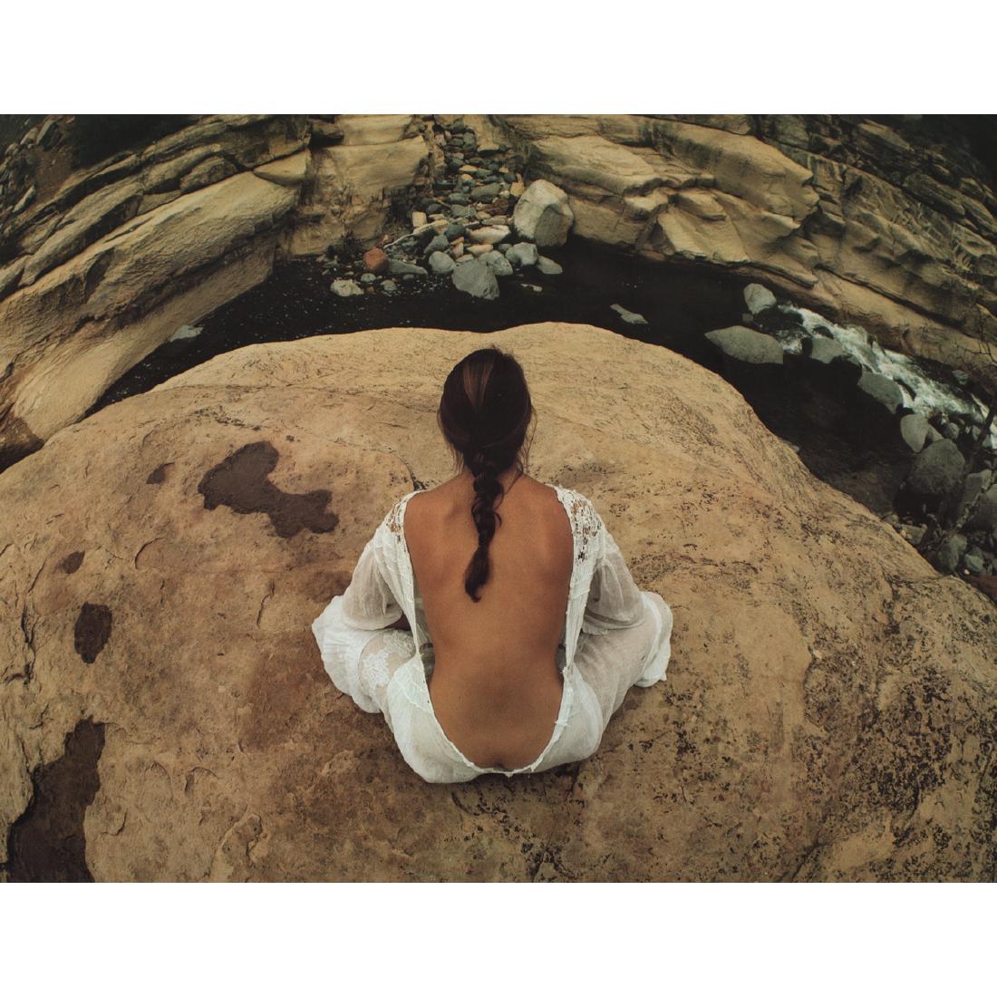 SAM HASKINS - Woman on a Boulder: Artist: SAM HASKINS Print Title: Woman on a Boulder Medium: Color Photo-Lithograph Printing Date: 1981 Printed in Japan Image Size: 14 X 11 inches Sam Haskins (1926-2009) was a British photographer, b