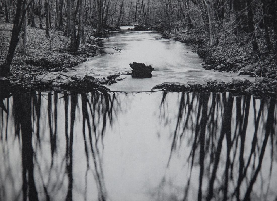 PAUL CAPONIGRO - River Reflection: Artist: Caponigro, Paul Title: River Reflection Medium: Sheet Fed Gravure, 1973, Switzerland Dimensions: 7.75x5.5" Heat Wax Mounted on 11x14" Conservation Board Paul Caponigro (1932), is an American p