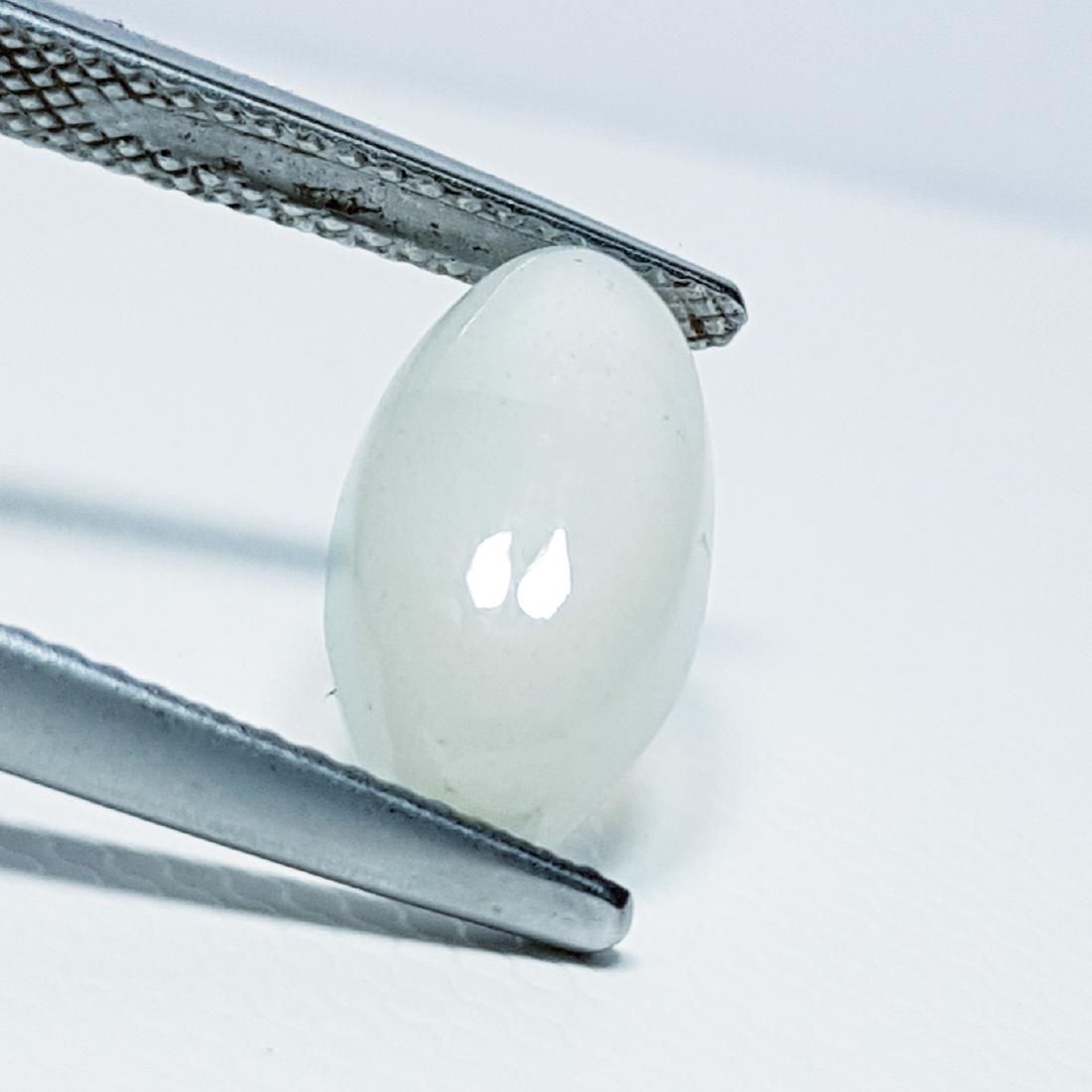 Candy Moonstone - 3.26 ct: Item: Candy Moonstone - 3.26 ct Loose gemstone Color/Clarity: VVS Carat Weights: 3.26 Size (mm): 13.20 x 7.25 x 4.70 Oval - Tamilnadu No Reserve: This lot starts at $1 and has no reserve as a courtesy