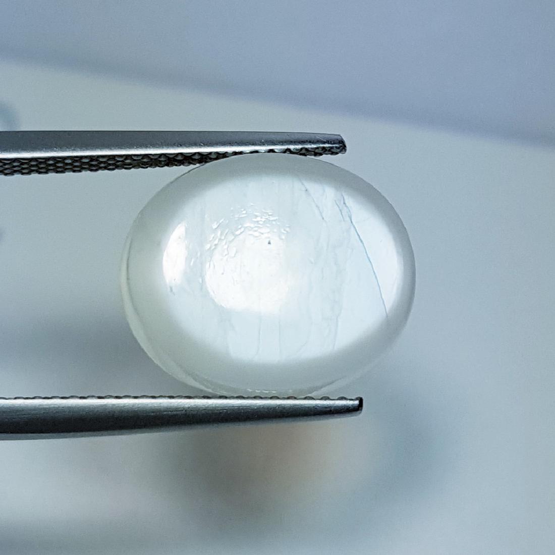 Candy Moonstone - 6.22 ct: Item: Candy Moonstone - 6.22 ct Loose gemstone Color/Clarity: VVS Carat Weights: 6.22 Size (mm): 15.00 x 12.45 x 3.70 Oval - Tamilnadu No Reserve: This lot starts at $1 and has no reserve as a courtes