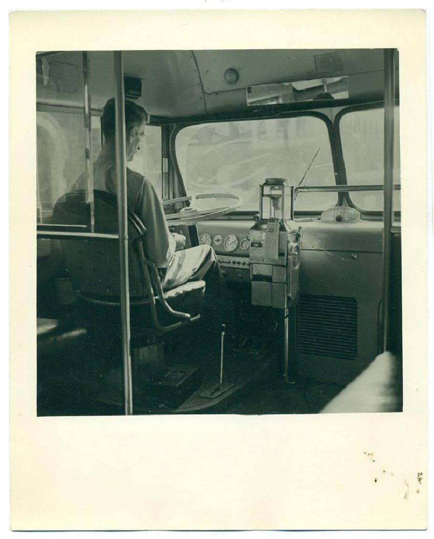 Vintage Occupational Bus Driver Inside Seated: VINTAGE OCCUPATIONAL BUS DRIVER INSIDE SEATED AT STEERING WHEEL Transportation Description: Vintage Art Photograph; Occupational view of bus driver at the steering wheel. Approximate size is 8" x 10".