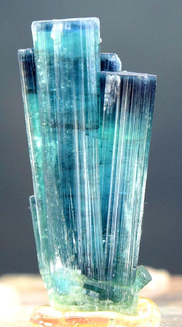 75 carats Terminated & Undamaged Natural Blue: 75 carats Terminated & Undamaged Natural Blue Tourmaline Crystal from Afghanistan - Weight : 75 carats Dimensions : 41*18*123 mm Origin : Afghanistan Treatment : Natural Specimen Standard DHL Shipping