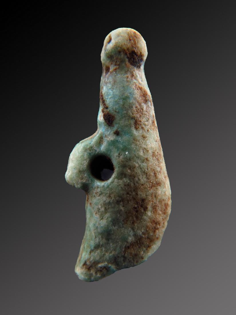 Egyptian Faience Amulet of White Crown of Upper Egypt: Item: Egyptian faience amulet of White Crown (hadjet) of upper Egypt Date/Period: 664 - 332 BC Materials: Faience Dimensions: 30 x 8 x 13 mm Please note that this lot has a confidential reserve. When