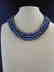 Triple strand pearl necklace of black / blue cultivated