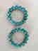 a set of two turquoise bracelace