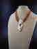 Triple strand necklace of opal beads, with - 9