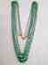 COLOMBIAN EMERALD THREE LINE 18 KT GOLD NECKLACES