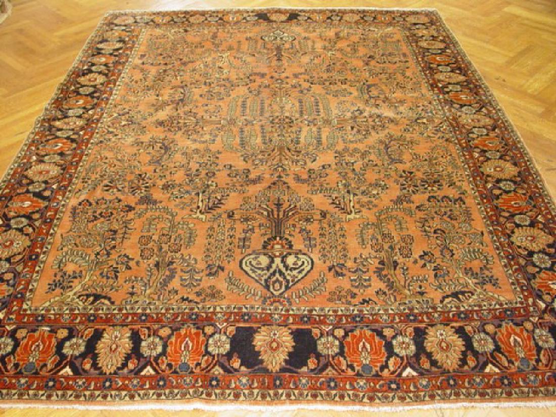 Persian Antique Rug Sarouk 9x11: Original Handmade Persian Sarouk rug. It’s not machine made, nor hand-tufted, it is authentic hand knotted in Iran. Please refer to the last picture (the back of the rug), which shows the authentici