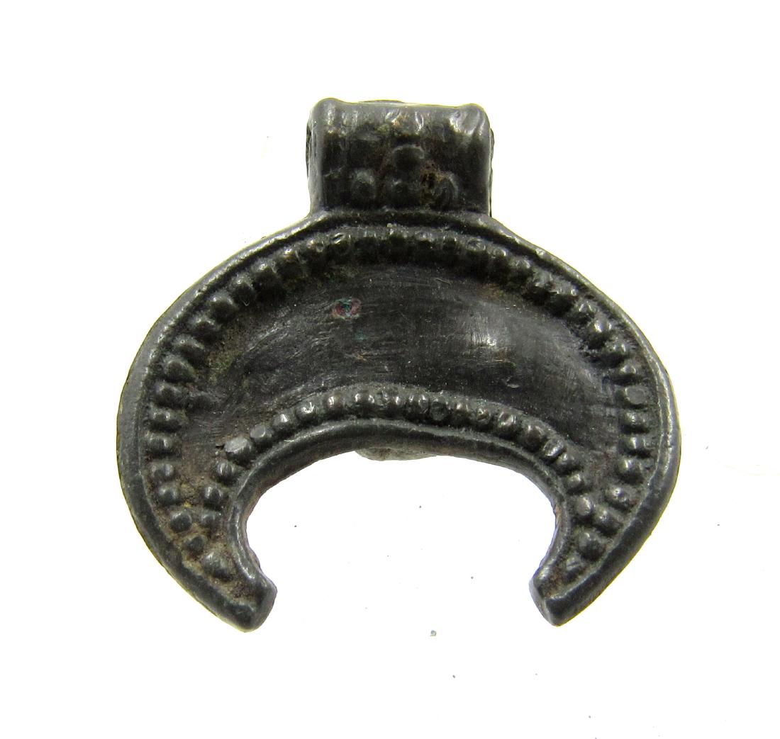 Medieval Viking Era Bronze Lunar Pendant: Medieval Viking Era Bronze Lunar Pendant Date: Circa 900 – 1100 AD Medieval Viking Era Bronze Lunar Pendant. Professionally cleaned and polished to show original details. This item includes a free g