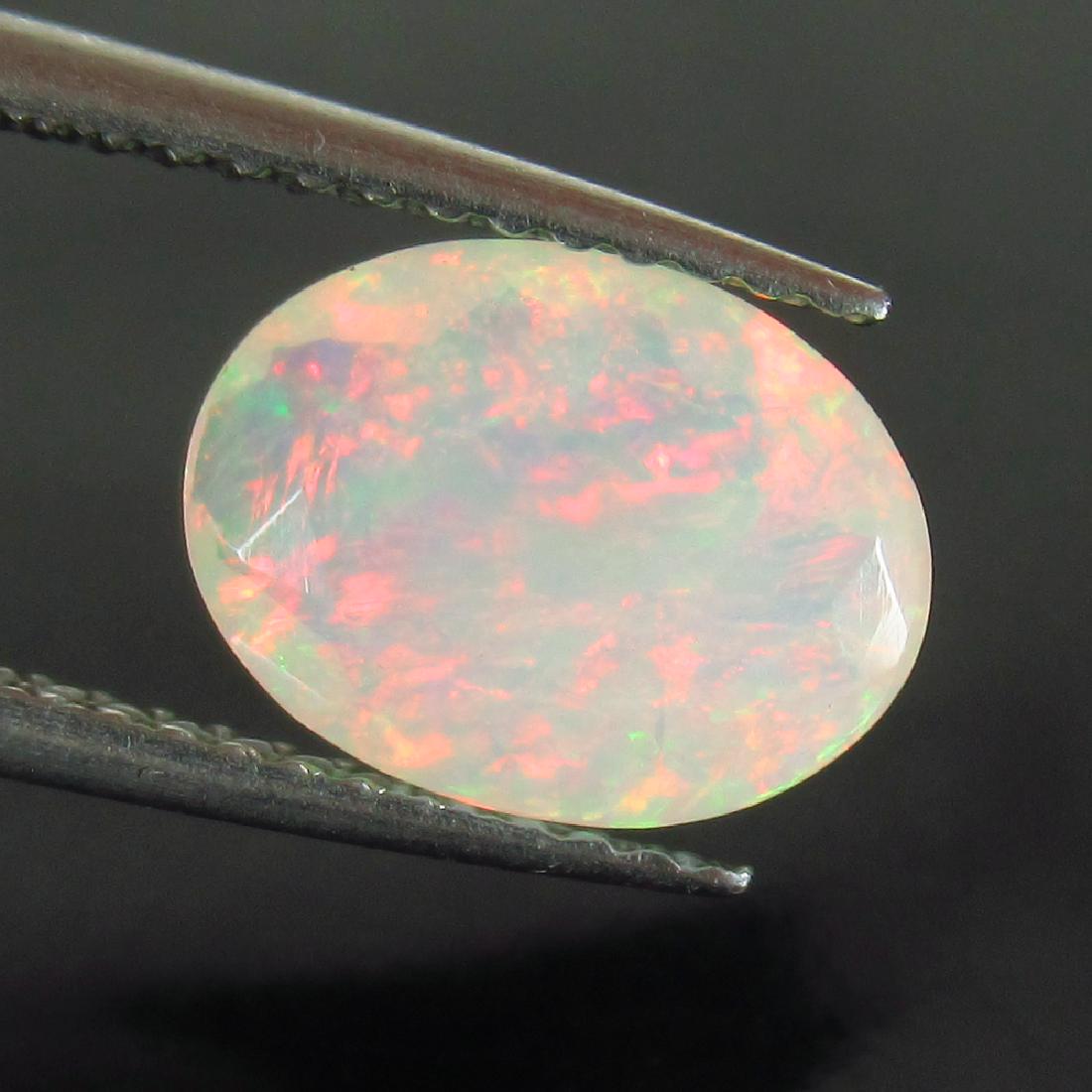 1.28 Ct Genuine Faceted Welo Opal Oval cut (1 of 2)