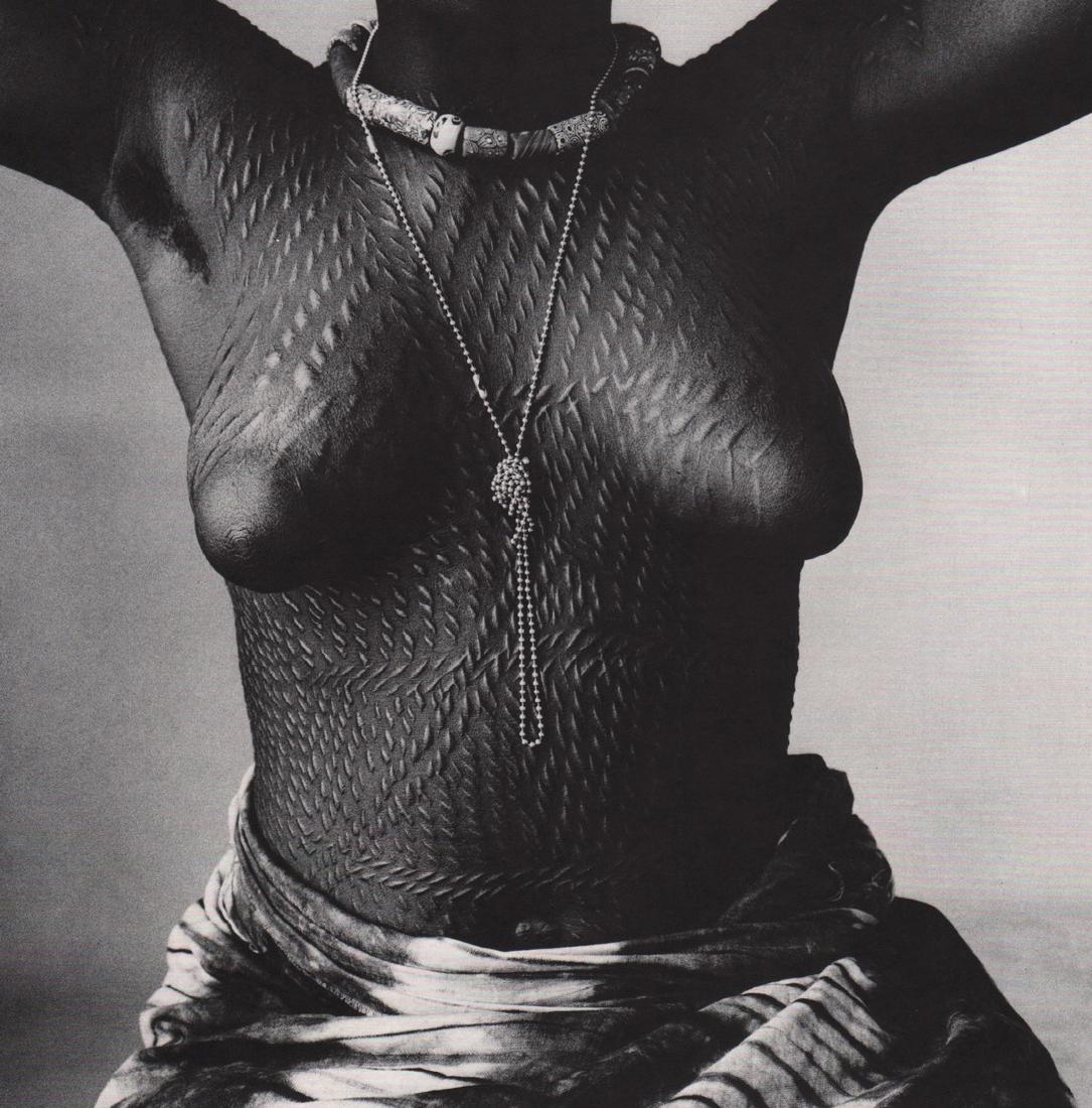IRVING PENN -Fetishist of Dahomey: Artist: IRVING PENN Print Title: Fetishist of Dahomey Medium: Photoengraving Printed 1974 in the US Image size (inches) approx.8 x 8” Irving Penn was an American photographer known for his fashion p