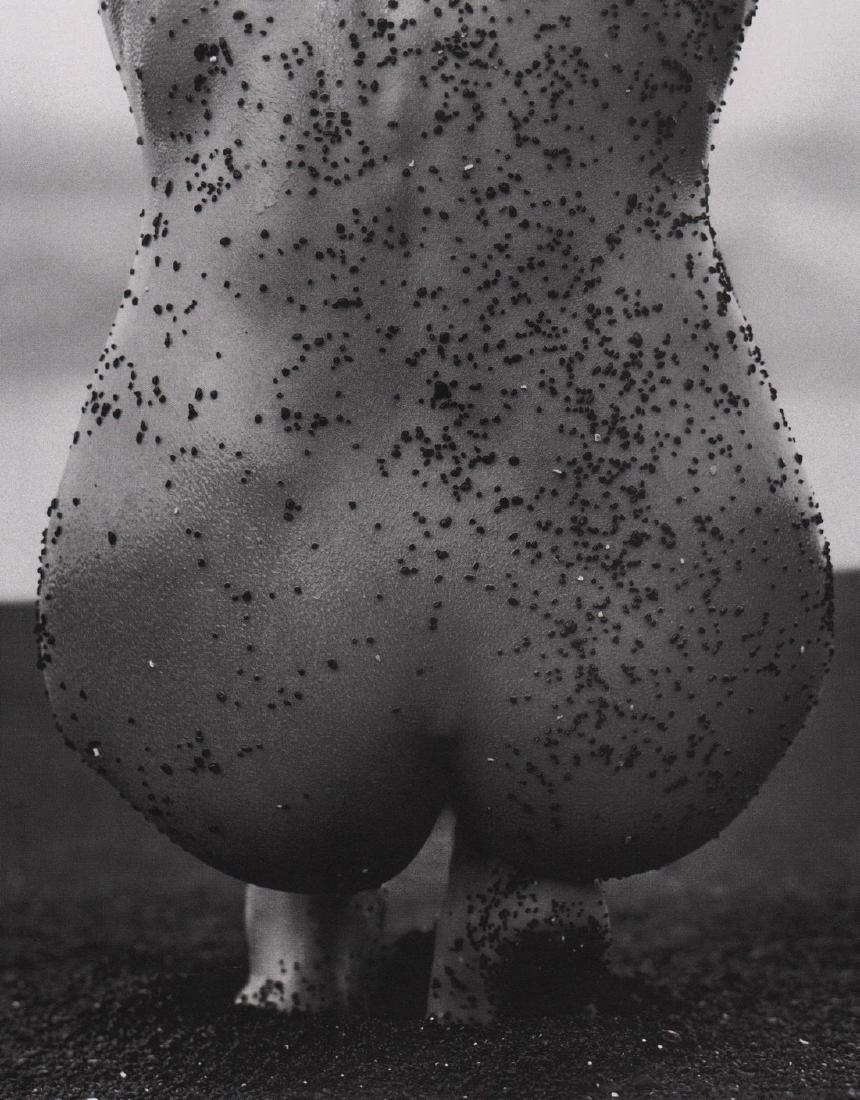 HERB RITTS - Female Nude with Black Sand, Hawai, 1989: Artist: HERB RITTS Print Title: Female Nude with Black Sand, Hawai, 1989 Printing Date: 1991 Medium: PhotoLitho Printed in: Japan Image Size: approx. 9x 7” Herbert "Herb" Ritts Jr. was an American f
