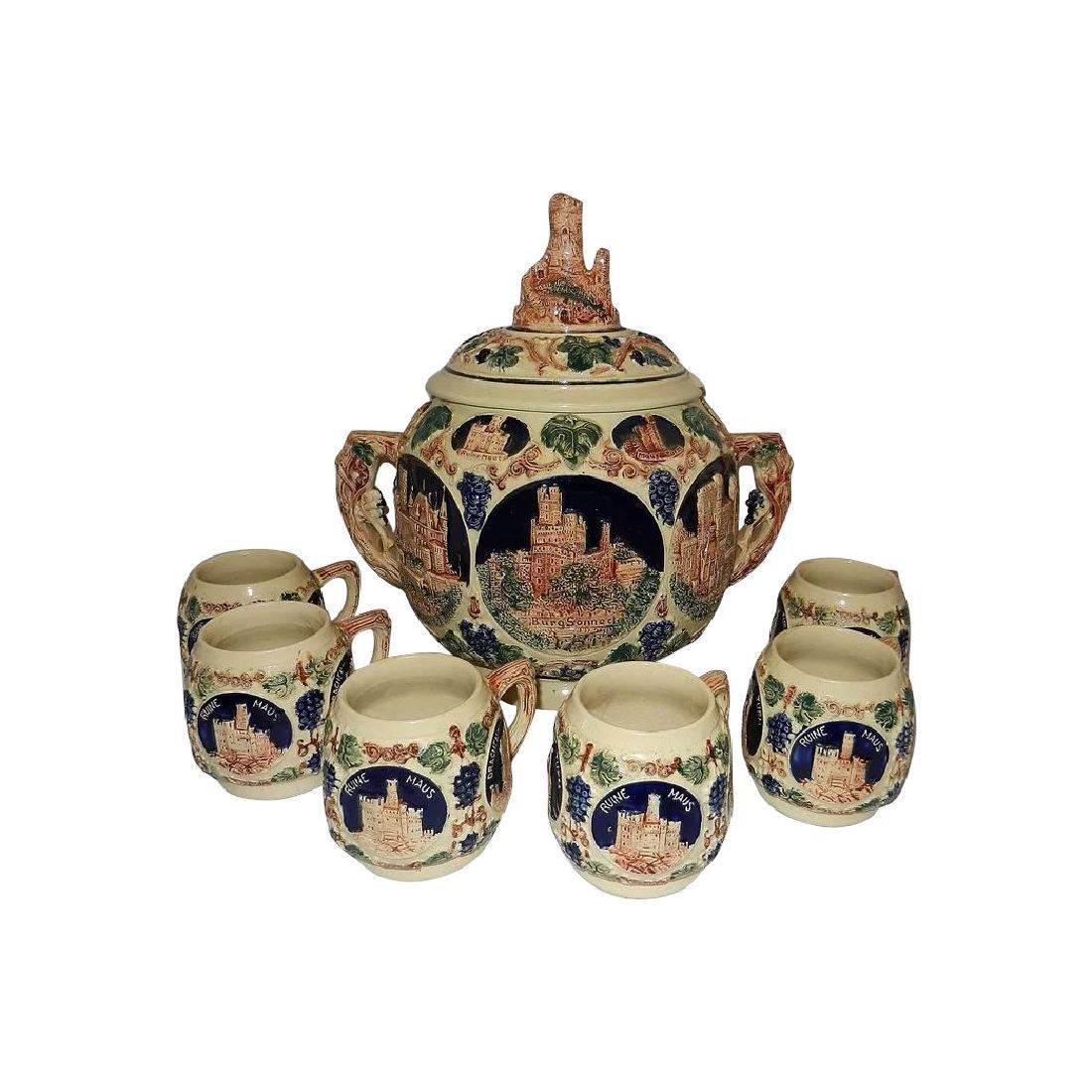 Vintage Gertz German Punch or Cider Bowl and Cups: This is an excellent Gertz German punch bowl with 6 cups. NO chips, cracks, etc. near MINT condition.What a great item to serve the spiced drinks of the holidays in. It measures 12" x 12" and will hol