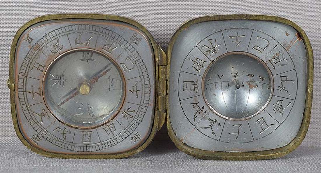19c multimetal netsuke COMPASS & SUNDIAL: Very unusual 19th century multi-metal netsuke in a form of a locking box opening to reveal a portable sundial in one half and a compass in the other, both working. Each device has 12 sections around i