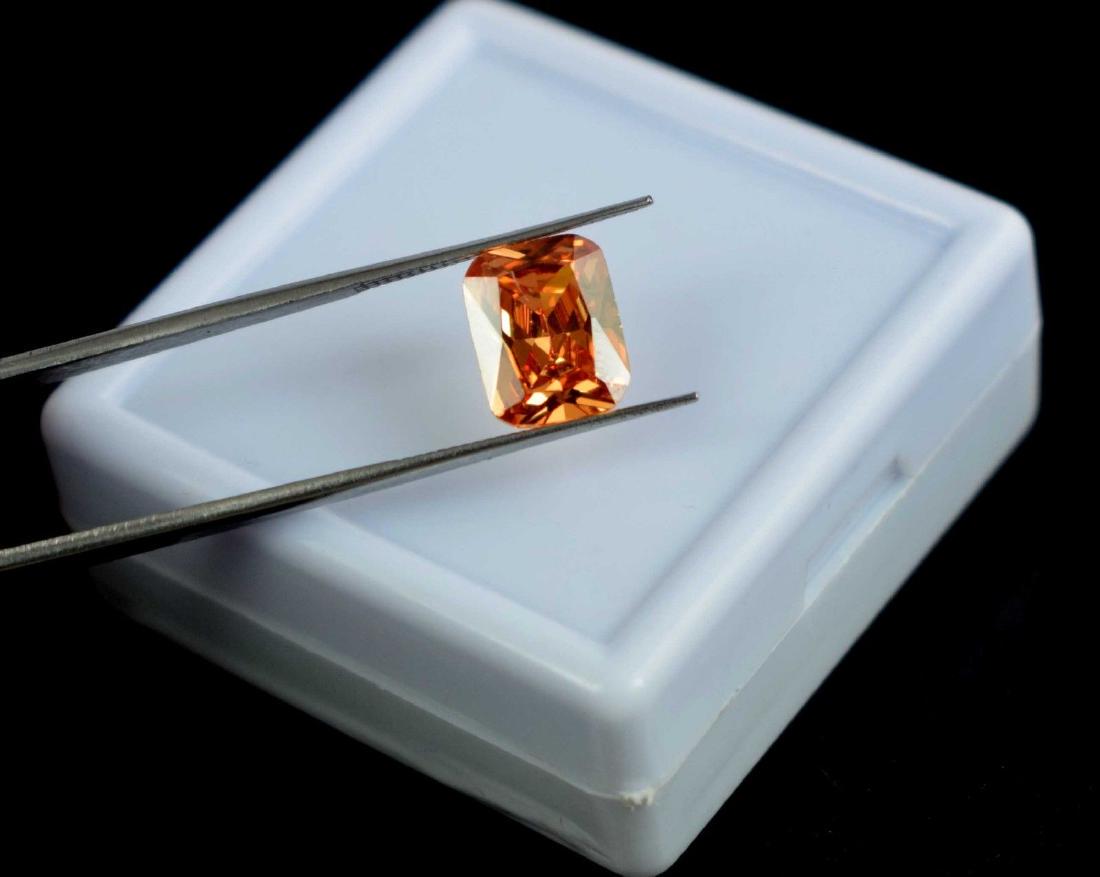 5.00 Ct Natural Champagne Zircon IGL Certified: Item: 5.00 Ct Natural Champagne Zircon IGL Certified Additional Information: Total Carat Weight (TCW): 5.00 Depth: 4mm Length: 10 mm Width: 8mm Certificate: IGL Country of Origin: Cambodia Shape: Emer