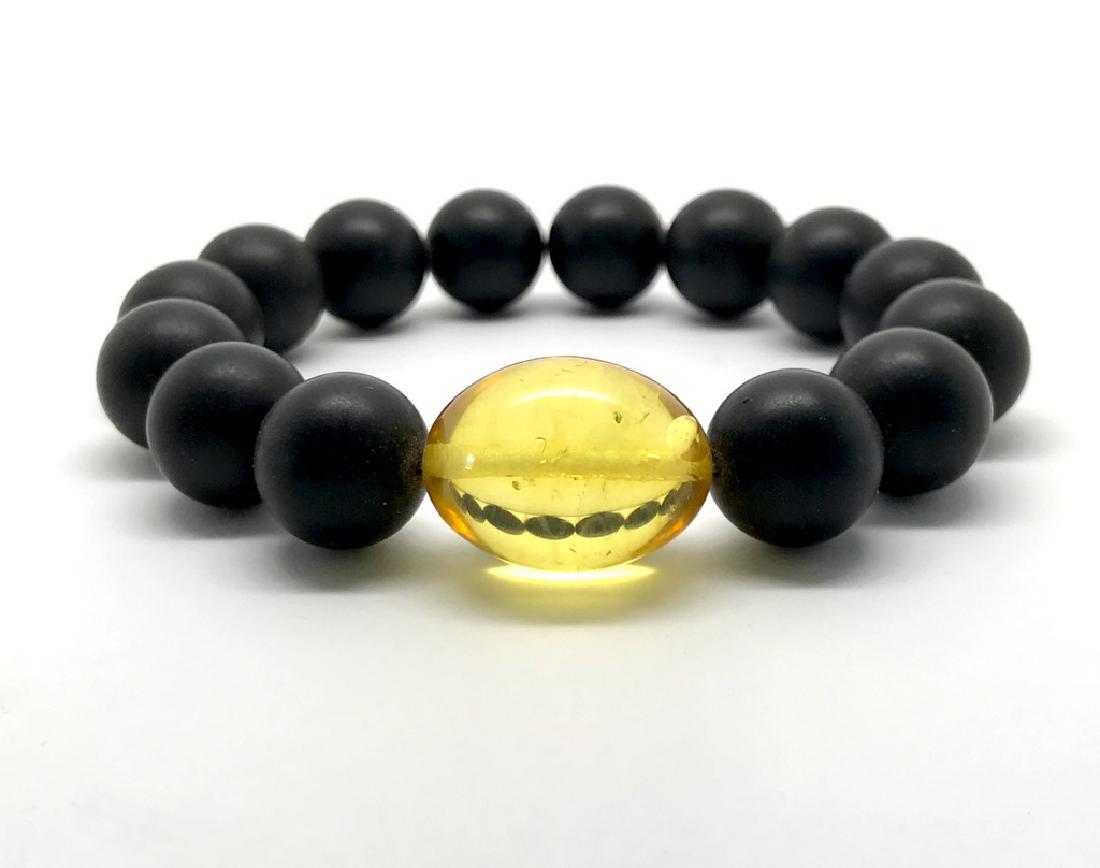 Bracelet Baltic amber beads lemon & black matte 17 gr (1 of 8)
