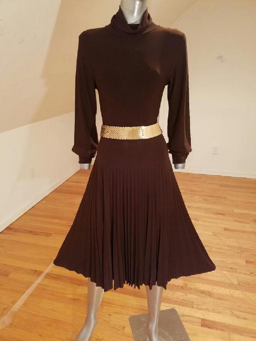 Vtg Jersey knit cocoa dress pencil pleated: This is a beauty in brown cocoa thin fine knit and lycra fabric high neckline and a bit of peasant puffed sleeves. The skirt is fluid pencil pleated. I have added this 1960's gold elastic metal belt j