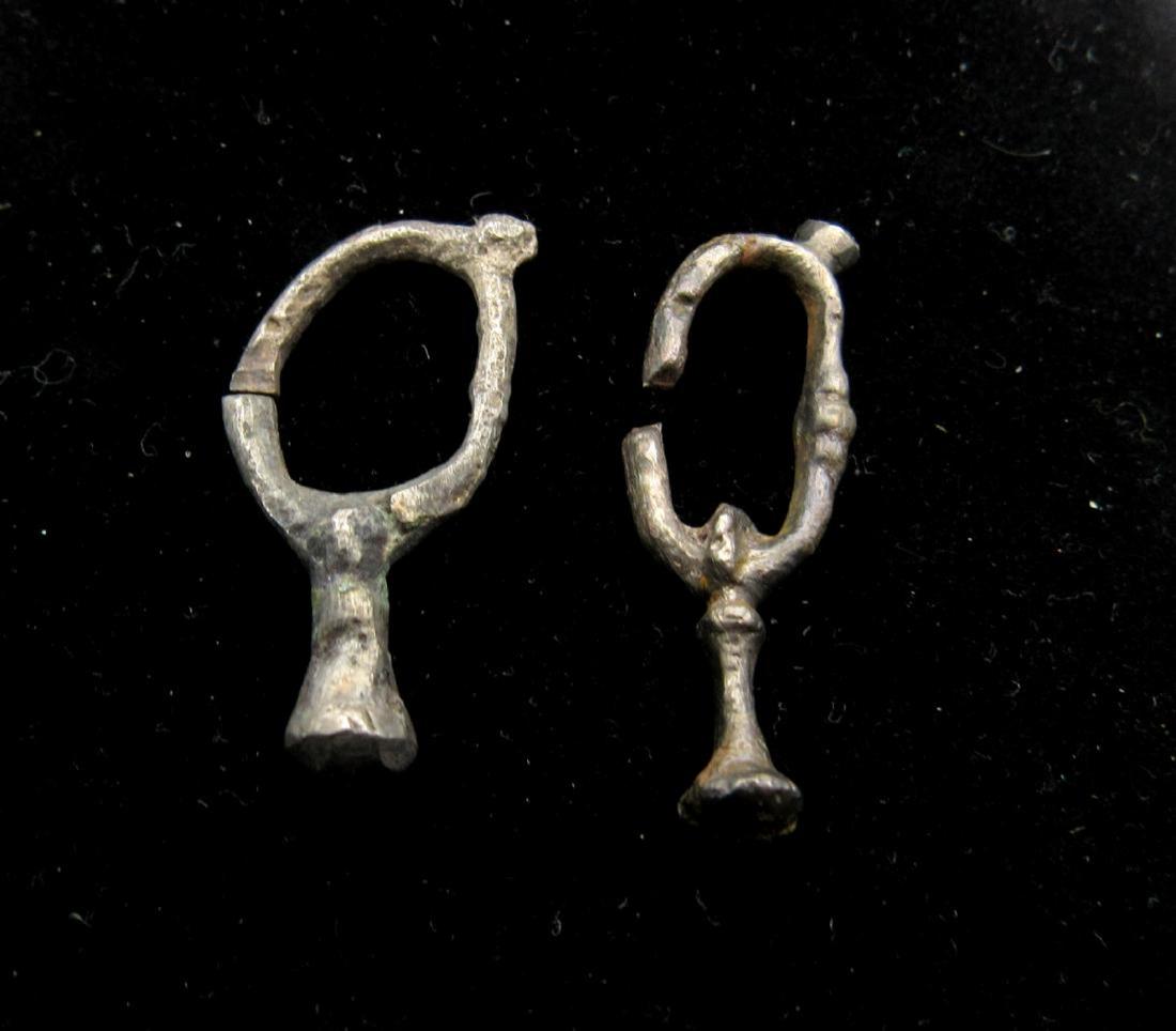 Pair of Medieval Viking Silver Earrings: Pair of Medieval Viking Silver Earrings Date: C. 900 - 1100 A.D. Rare Pair of Medieval Viking Silver Earrrings.Expertly cleaned/polished and conserved to reveal the original look of the item, it also 