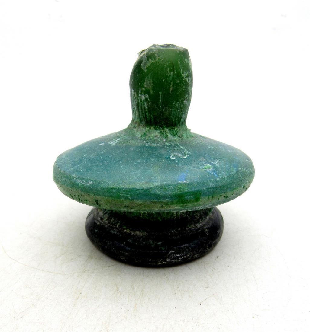 Ancient Roman Glass Flask: Ancient Roman Glass Flask Date: ca. 100 - 300 AD Whilst the ancient Egyptians and Phoenicians developed coloured glass, mainly for inlays, beads, etc., it was the Romans who perfected the development 