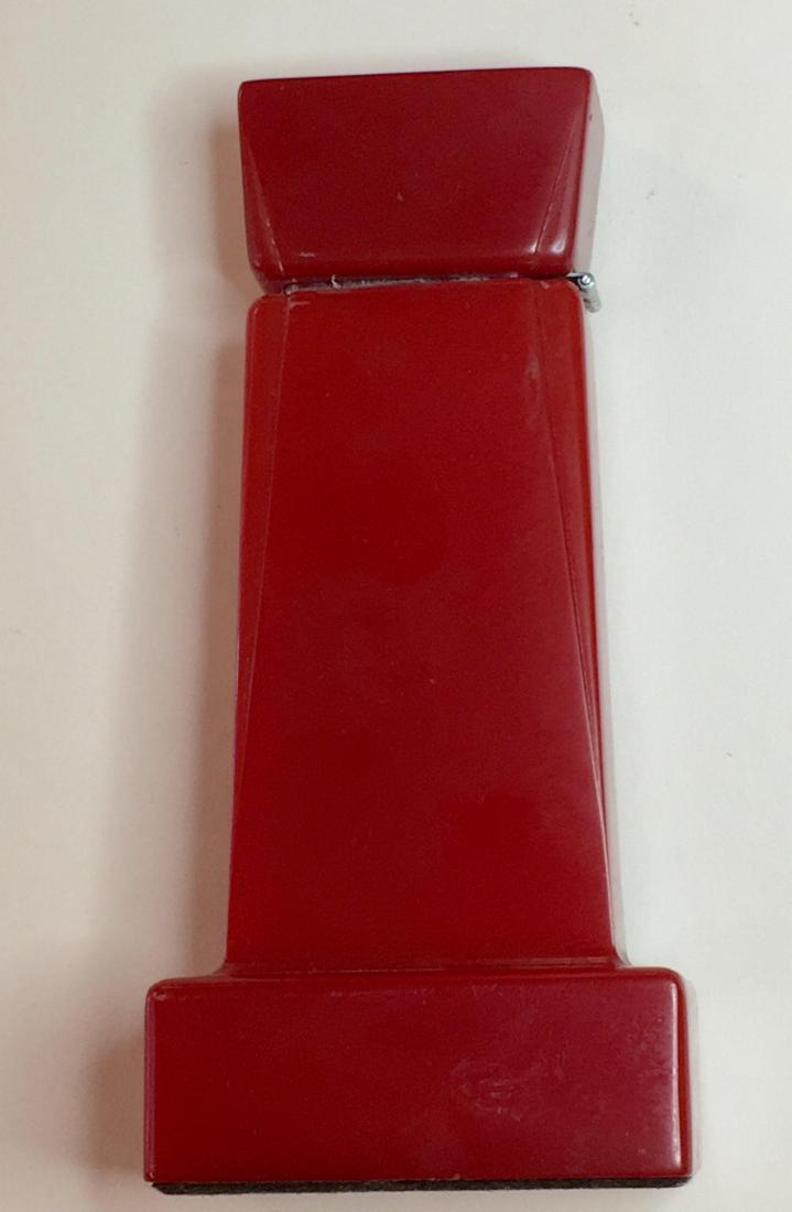 Red Tall Table Lighter: Red Bakelite Tall rectangular Table lighter with Engraved Initials CEM on 1 side. Lighter Fluid fueled Please note that this lot has a confidential reserve. When you leave a bid in advance of the auct