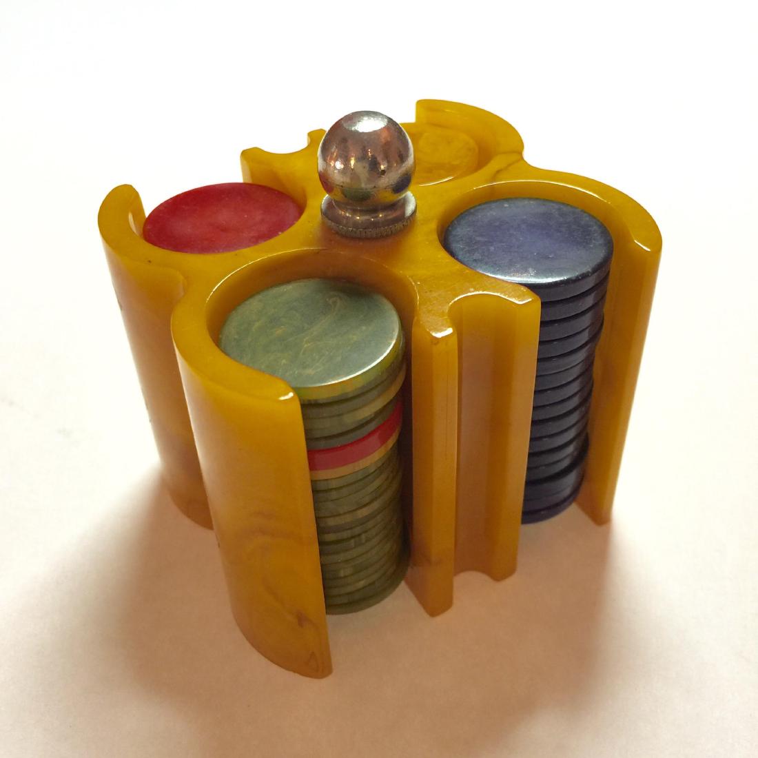 Butterscotch Poker Chip Holder with 4 colors of chips: Small size chip holder with minor interior craze mark and 4 kinds of bakelite chips Please note that this lot has a confidential reserve. When you leave a bid in advance of the auction, submit your ma