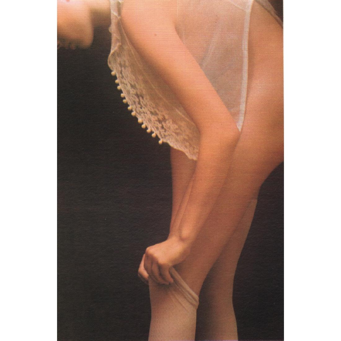 DAVID HAMILTON - Cecilia: Artist: DAVID HAMILTON Print Title: Cecilia putting on her Stockings Medium: Color Photo-Lithograph From a Limited Edition Folio (1140/2500) Printing Date: 1974 Printed in West Germany Image Size: app