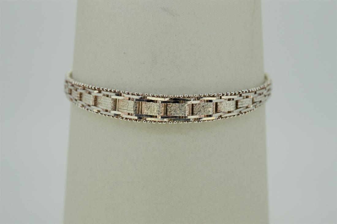 7" Byzantine Style Sterling Silver Bracelet: Item: 7" Byzantine Style Sterling Silver Bracelet Brand: Unbranded Metal Purity: .925 Sterling Silver Gemstones: N/A Carat Weights TW: N/A Size/Dimensions: 7" long With safety clasp & chain, 7.7 dwt o