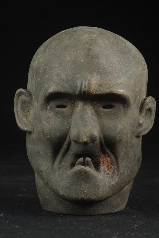Mask With Scary Face Atoni West Timor Indonesia: Mask with scary face - Atoni - West Timor - Indonesia Cm 21 x 16 x 8 (8.3" x 6.3" x 3") Weight: 370 g This expressive mask has a quite realistic design, depicting an angry and scary face with hard fea