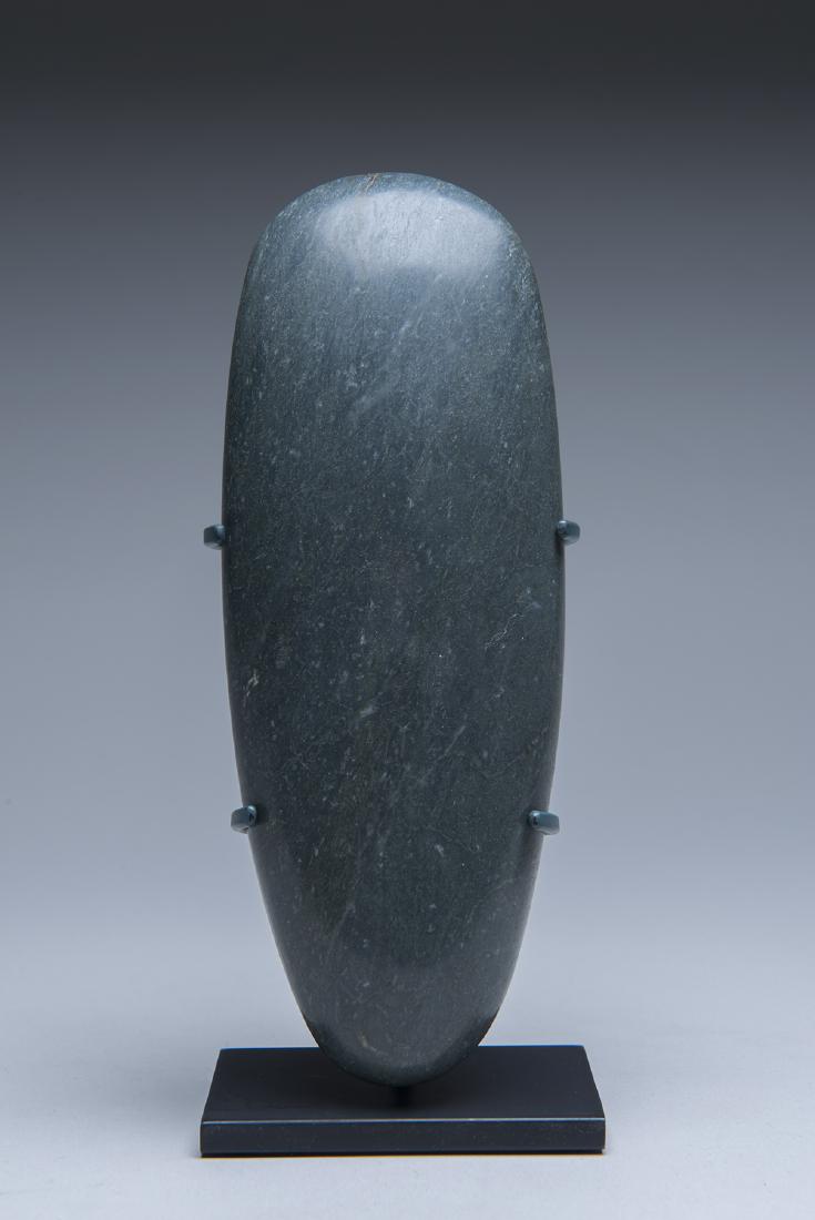 Important blue green jade celt used by lord kings (1 of 2)