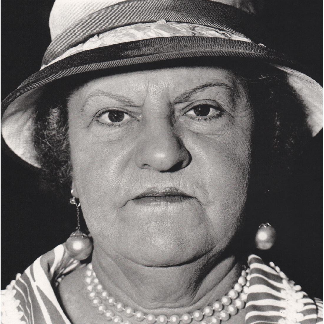 DIANE ARBUS - Woman with Pearls: Artist: DIANE ARBUS Print Title: Woman with Pearls, New York City 1967 Medium: Sheet-fed Gravure Printing Date: 1970's Printed in Switzerland Image Size: 7 x 7 inches Diane Arbus (1923-1971) was an Am