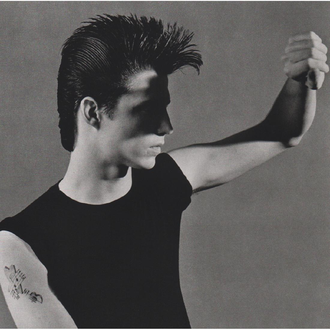 ROBERT MAPPLETHORPE - Tim Scott: Artist: ROBERT MAPPLETHORPE Print Title: Tim Scott, 1980 Medium: Sheet-fed Gravure Printing Date: 1980's Printed in Japan Image size approx: 10 X 10 inches Robert Mapplethorpe was an American photogra