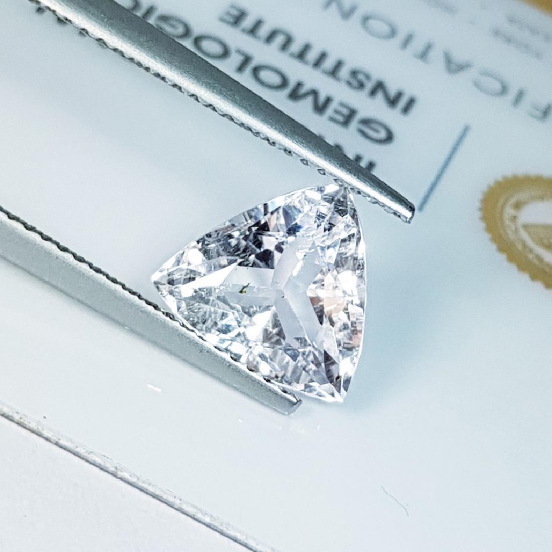 IGI CERTIFIED Pink Beryl - 2.10 ct: Item: "IGI CERTIFIED" Pink Beryl - 2.10 ct Loose gemstone Color/Clarity: VVS Carat Weight: 2.1 Size (mm): 9.20 x 10.05 x 4.82 Triangle - Afghanistan No Reserve: This lot starts at $1 and has no reserv