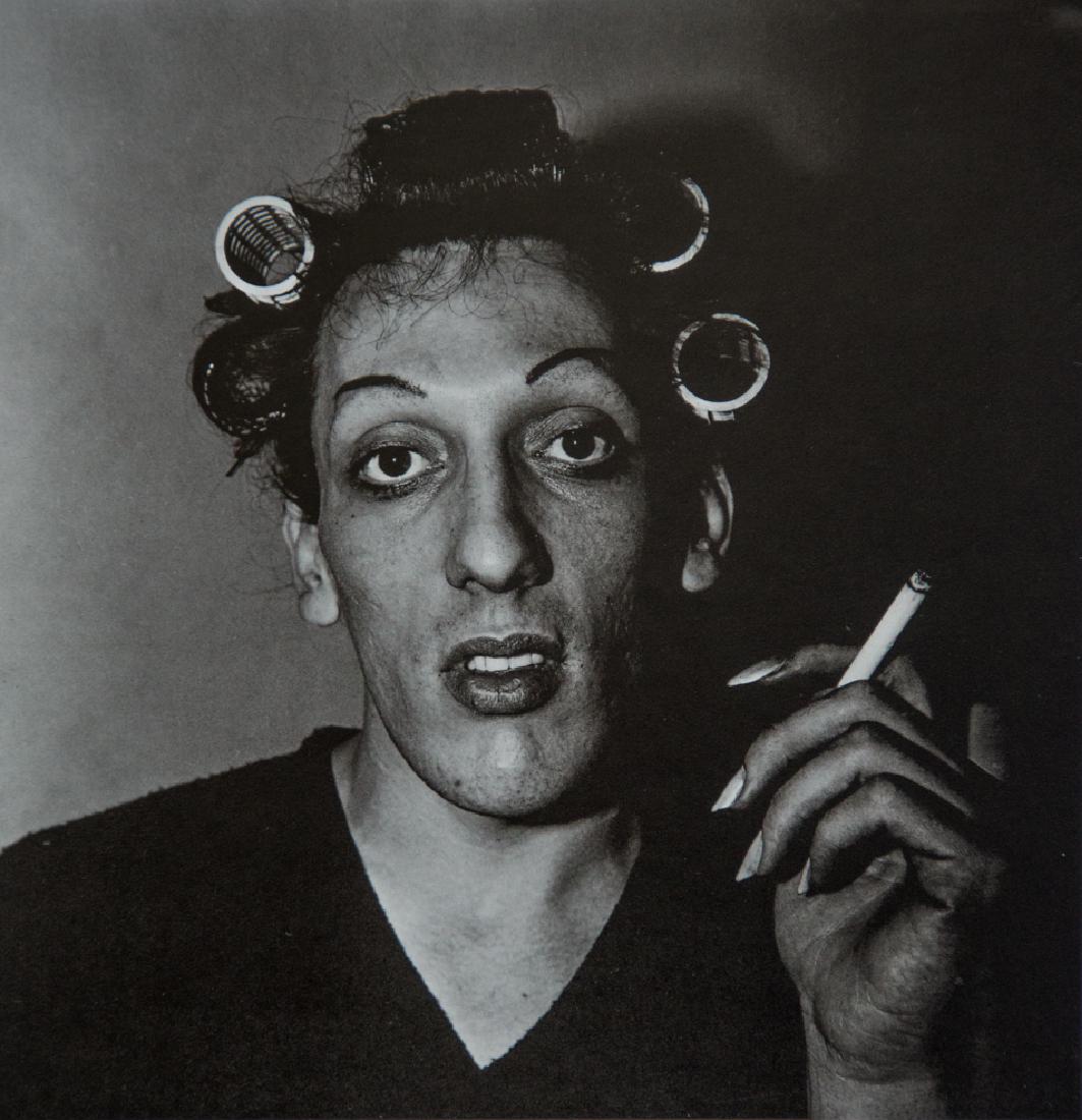 DIANE ARBUS - A Young Man In Curlers at Home, 1966: Artist: Arbus, Diane Title: A Young Man In Curlers at Home, 1966 Medium: Photo Litho, 1978, USA Dimensions: 6.2x6.3" Heat Wax Mounted on 11x14" Conservation Board Diane Arbus was an American photograp
