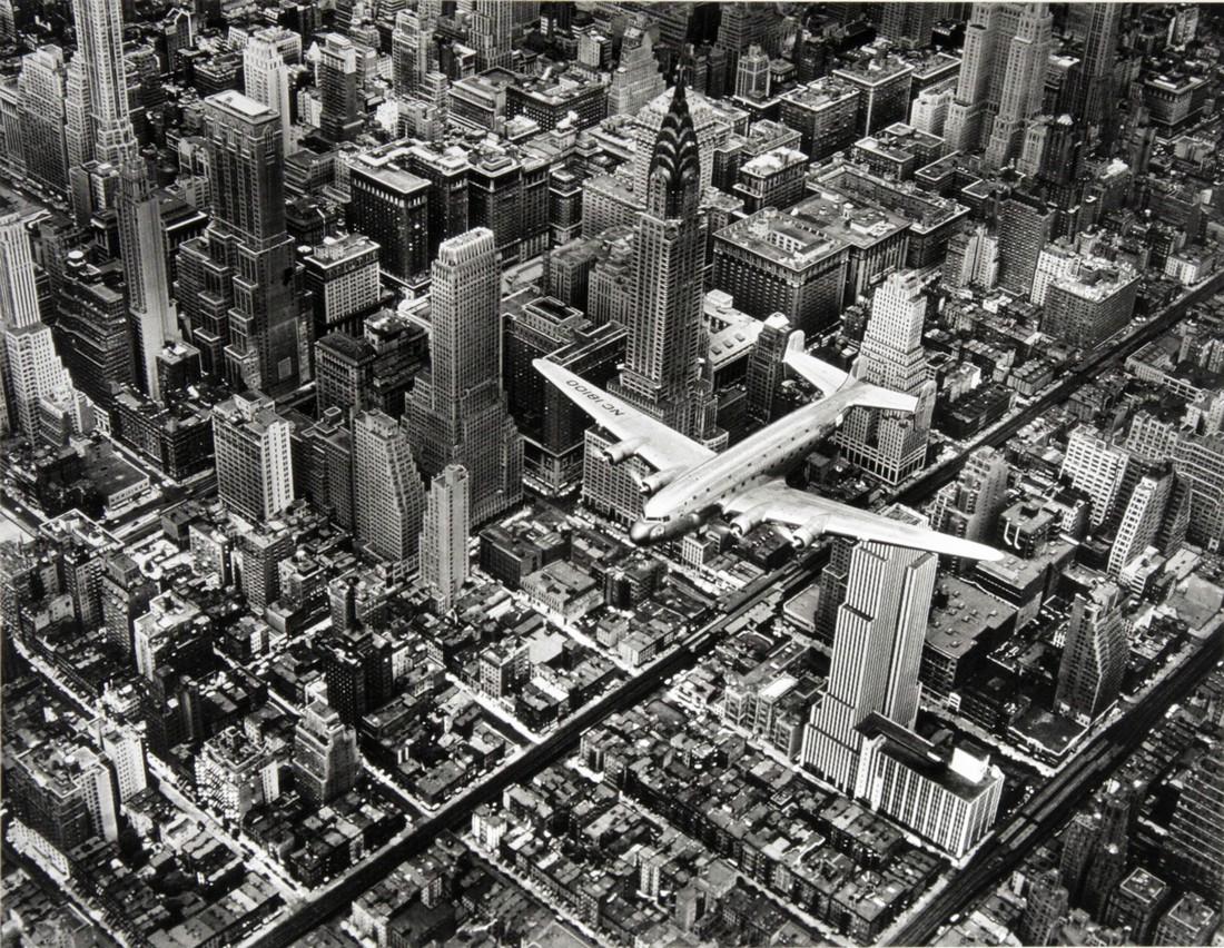 MARGARET BOURKE-WHITE - DC-4 flying over Manhattan: Artist: Margaret Bourke-White Title: DC-4 flying over Manhattan, 1939 Date Printed: 2006 Medium: Photo Lithographic Print Printer Location: Contrasto Italy Size: 18.5x24.5cm - 7.2x 9 inch Mount Size: