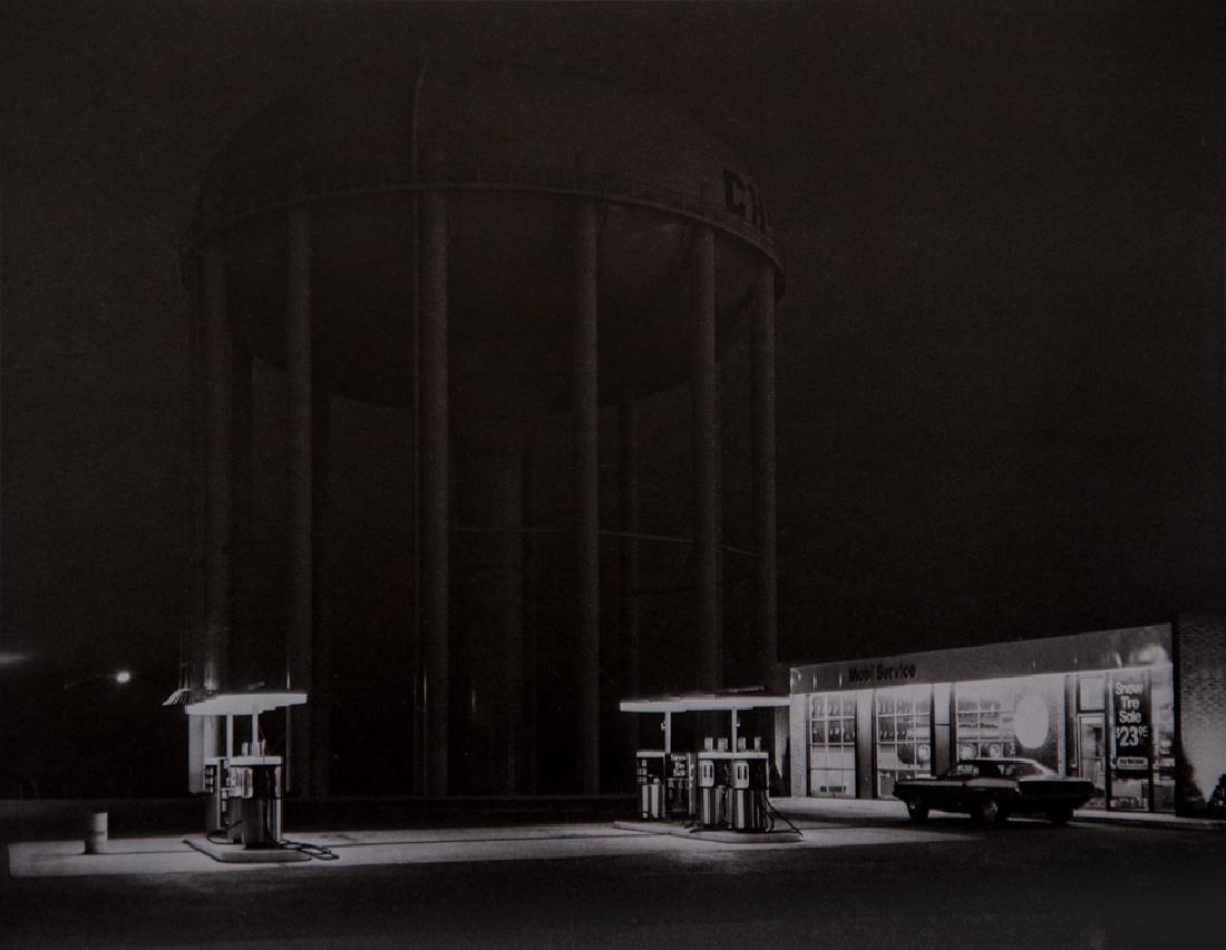 GEORGE A. TICE - Petit's Mobil Station and Watertower,: Artist: Tice, George A. Title: Petit's Mobil Station and Watertower, 1974 Medium: Photo Litho, 1978, USA Dimensions: 8.5x6.5" Heat Wax Mounted on 11x14" Conservation Board George A. Tice is an America
