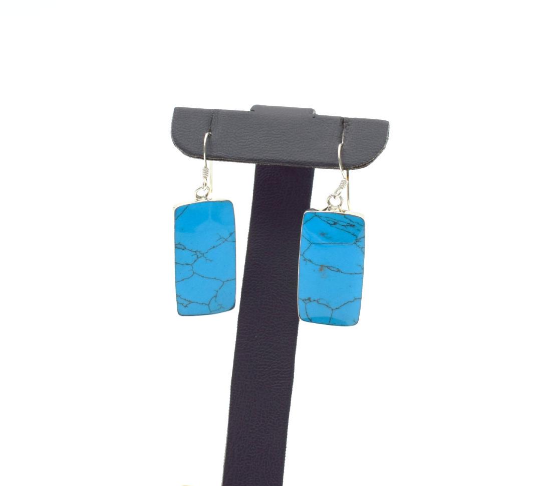925 Sterling Silver Handmade A pair of Marcasite: Title: 925 Sterling Silver Handmade A pair of Marcasite Earring with Torquise Stone Gemstones: Torquise Weight: 6.94 gr Size/Dimensions: 36 x 13 mm Please note that this lot has a confidential reserve