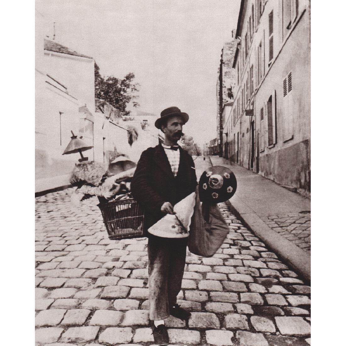 EUGENE ATGET - Marchand d’abat-jour: Artist: EUGENE ATGET Print Title: Marchand d’abat-jour, rue Lepic, 1899 Medium: Sheet-Fed Gravure Printing Date: 1980's Printed in France Image Size approx: 8.5 x 10.5 inches Jean-Eugène-Auguste At