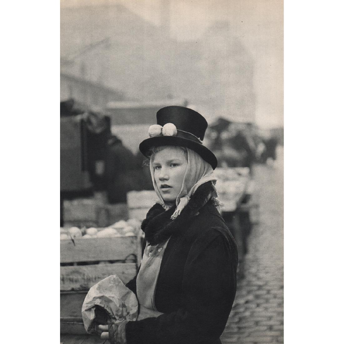 HENRI CARTIER-BRESSON - Girl selling Lemons: Artist: HENRI CARTIER-BRESSON Print Title: Girl selling Lemons at the fish market, Hamburg Medium: Sheet-fed Gravure Printing Date: 1950's Printed in France Image Size: 9 x 13 inches Henri Cartier-Bre