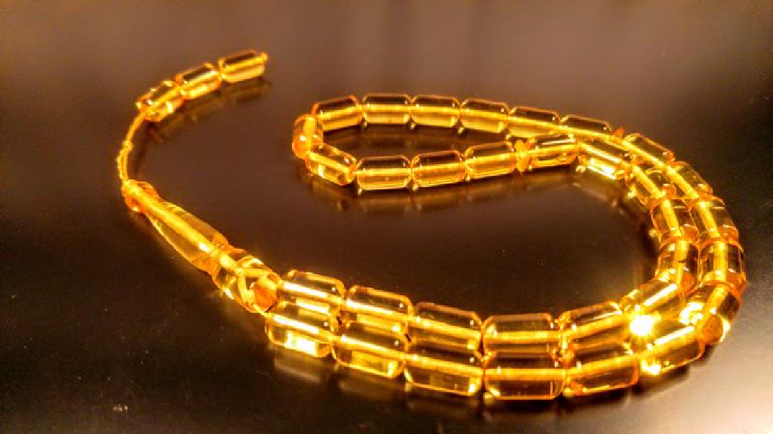 Lemon colour 33 Beads Muslim Tasbih Misbaha 100%: Title: Lemon colour 33 Beads Muslim Tasbih Misbaha 100% Genuine Baltic Amber prayer Carat Weights: 19 gm Size/Dimensions: 28 cm 100% Genuine Baltic Amber from Yantarny, Russia. Solid amber, made of mo