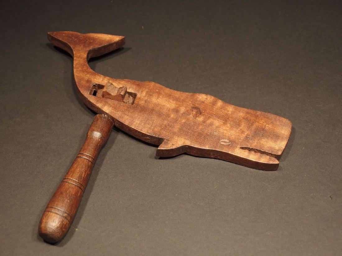 Wood Rattle Figural Whale Noisemaker: Vintage Antique Style Wood Rattle Figural Whale Noisemaker Description 8 5/8" Long x 7 1/2" Tall Wonderful reproduction wood carved noisemaker/rattle. Great figural piece. Simply twirl the figure for 