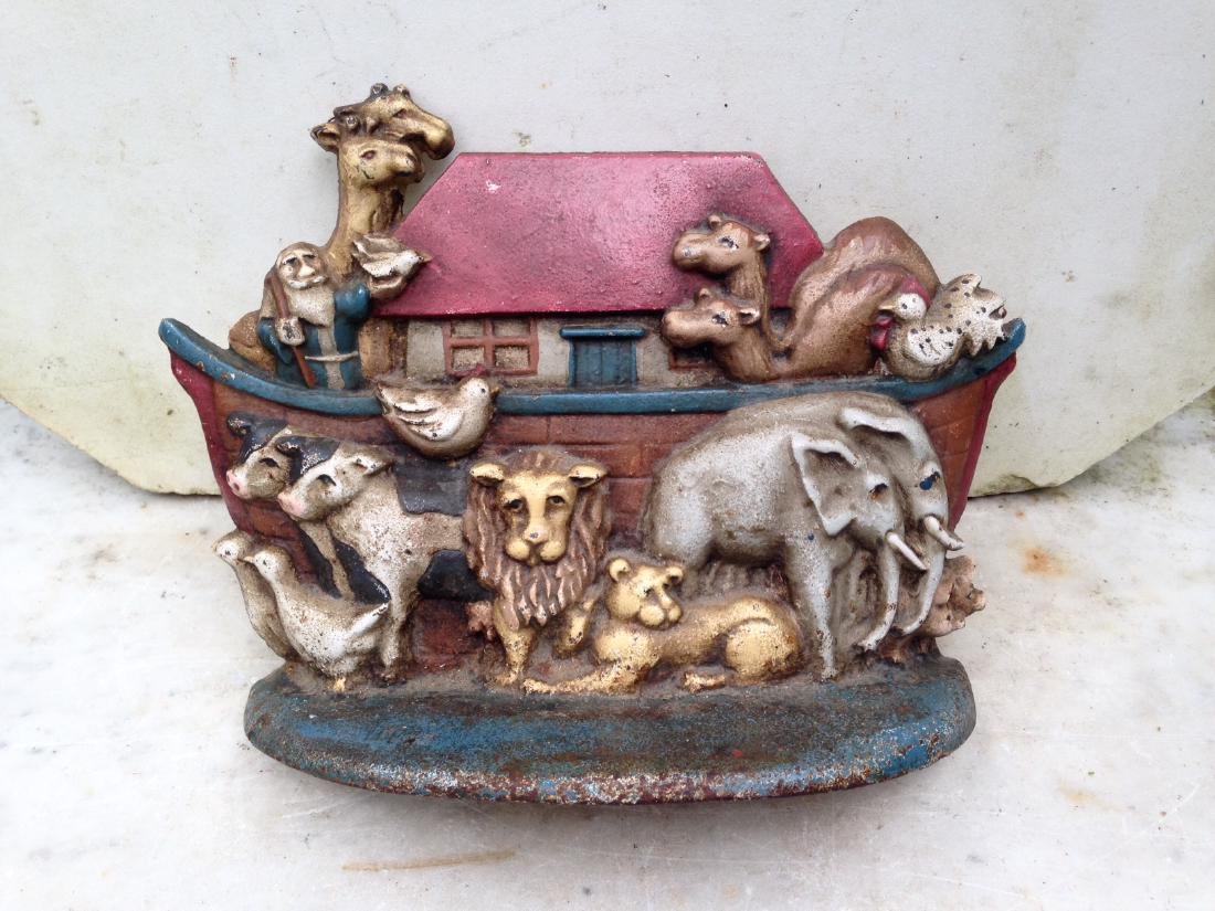 20thc Noah's ark cast iron doorstop in original paint: 20thc Noah's ark cast iron doorstop in original paint 20thc 10" wide x 7" high Please note that this lot has a confidential reserve. When you leave a bid in advance of the auction, submit your maximum